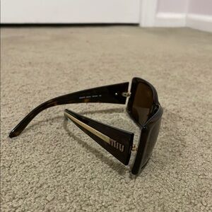 Miu Miu Tortoise Shell Sunglasses